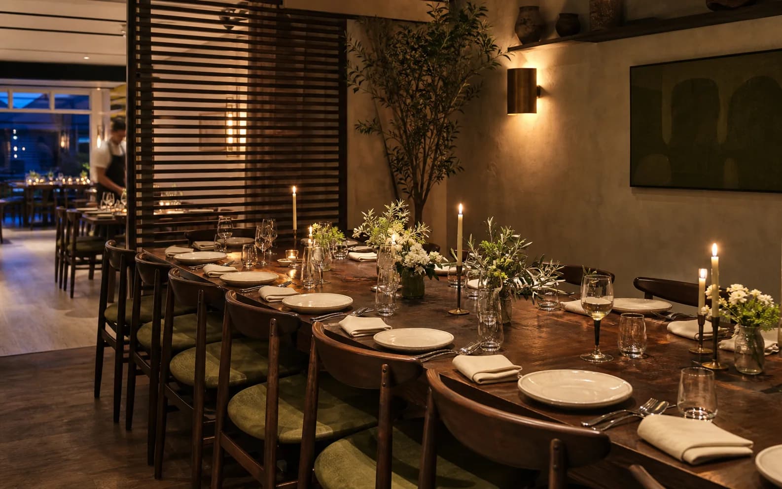 Private dining table for twelve with linen and candles at Linden Table in Ealing
